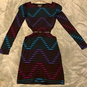 BeBe XXS long sleeve, diamond side cut-outs on the sides with a zipper in middle